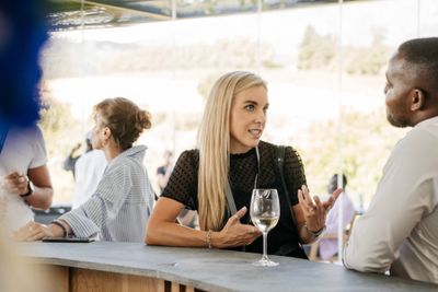 A man and a woman at the bar.