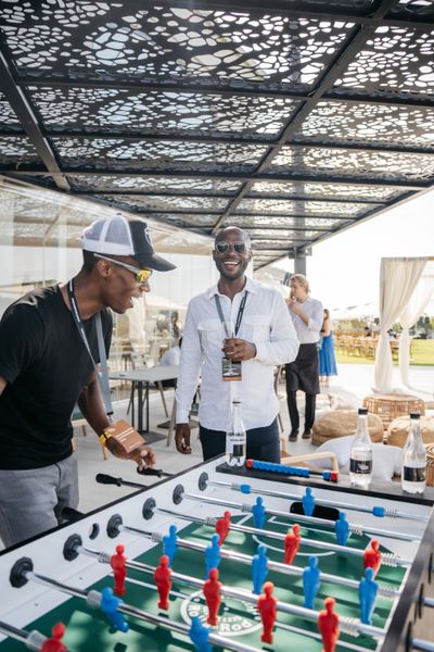 People playing table soccer.